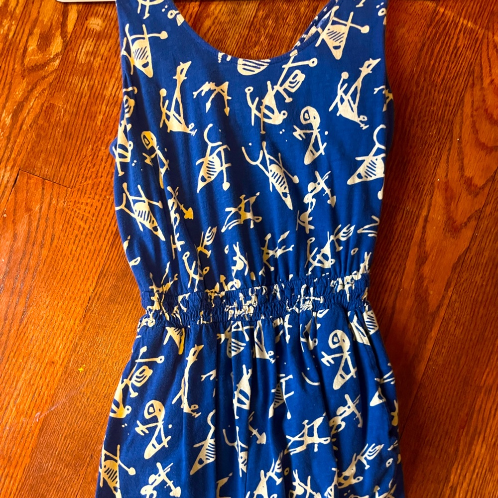This is a blue jumpsuit by Forever 21 in size Medium
